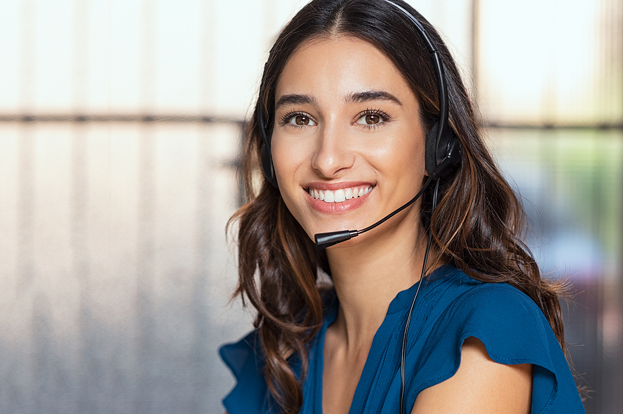 bigstock-Customer-support-woman-smiling-287596636