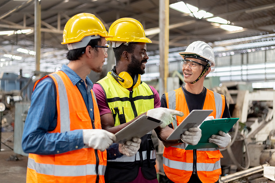 bigstock-Three-Man-Industrial-Engineers-469195399-1